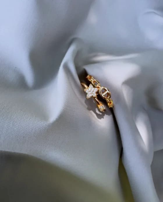 Gold-tone stackable ring with a star detail